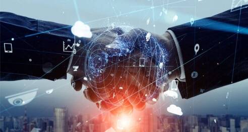 Two people in business suits shaking hands, with digital graphics of networks, icons, and a glowing globe overlaying the image—symbolizing global business, Operational Excellence, and technology connections against a cityscape background.