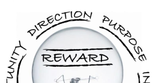 A circular diagram with the word “REWARD” in the center. Surrounding words on the outer ring include “DIRECTION,” “PURPOSE,” and partially visible words, including “OPPORTUNITY.”.