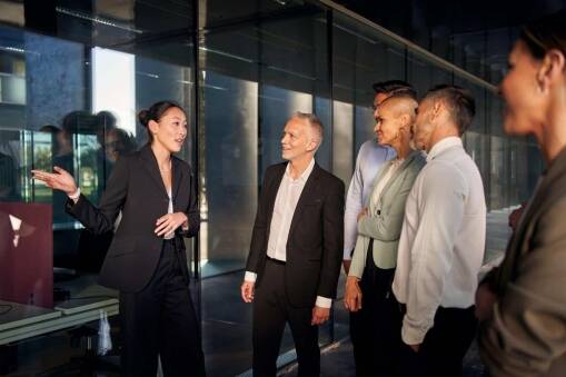 team meeting for continuous improvement leadership in an organization